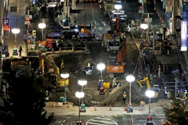 LED balloon light towers illuminate a construction site in Fukuoka. 