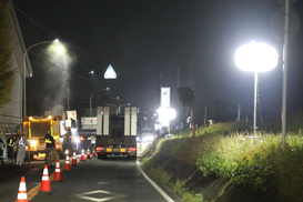 A number of balloon light towers are being used at night road maintenance.